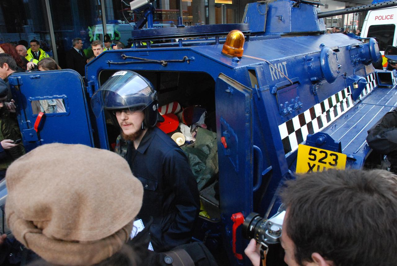 Illustration for article titled Vigilante Hippie Six-Wheeled Riot Tank Tries To Battle G20 Summit Protesters